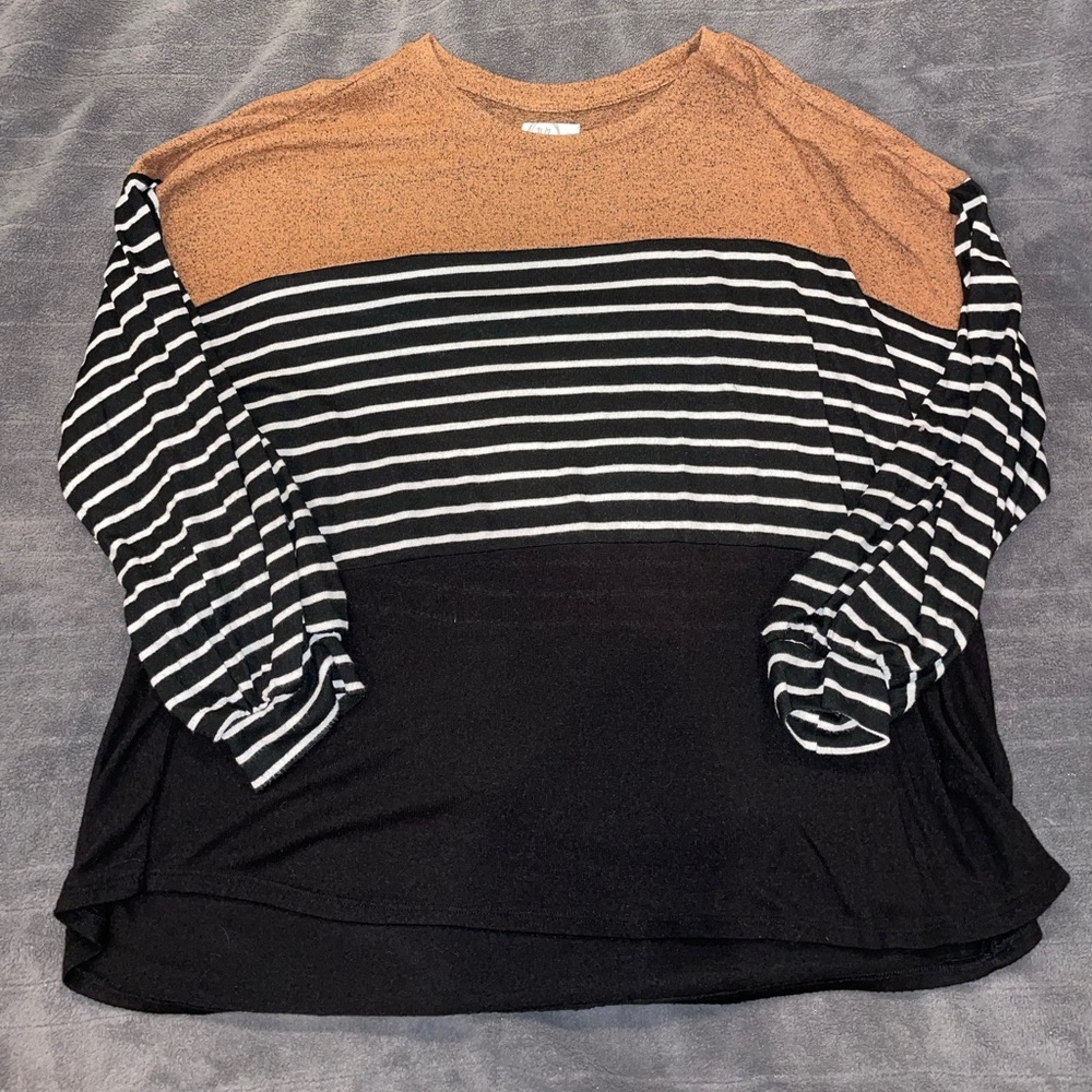 Tan, black and white blouse.